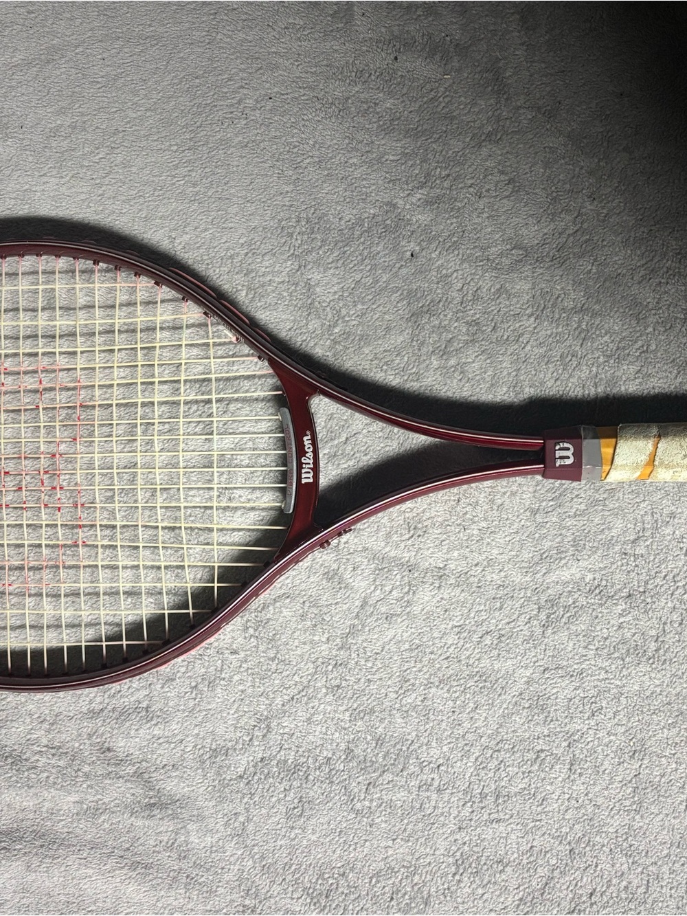Wilson Burgundy Tennis Racket with Cream/Yellow Grip